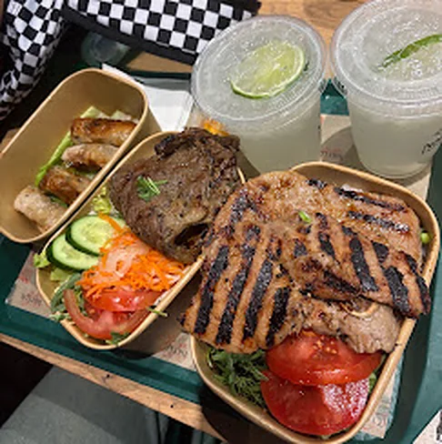 Grilled ribeye and pork rice plates with limeades at Nón Lá Express, Flushing