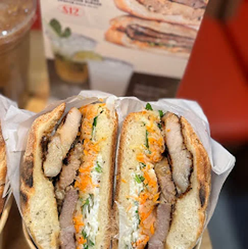 Vietnamese burger - Nón Lá Express Nón Lá Express Vietnamese-style burger with pickled carrot and herbs